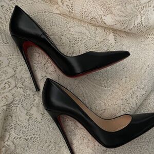 Black louboutin heels